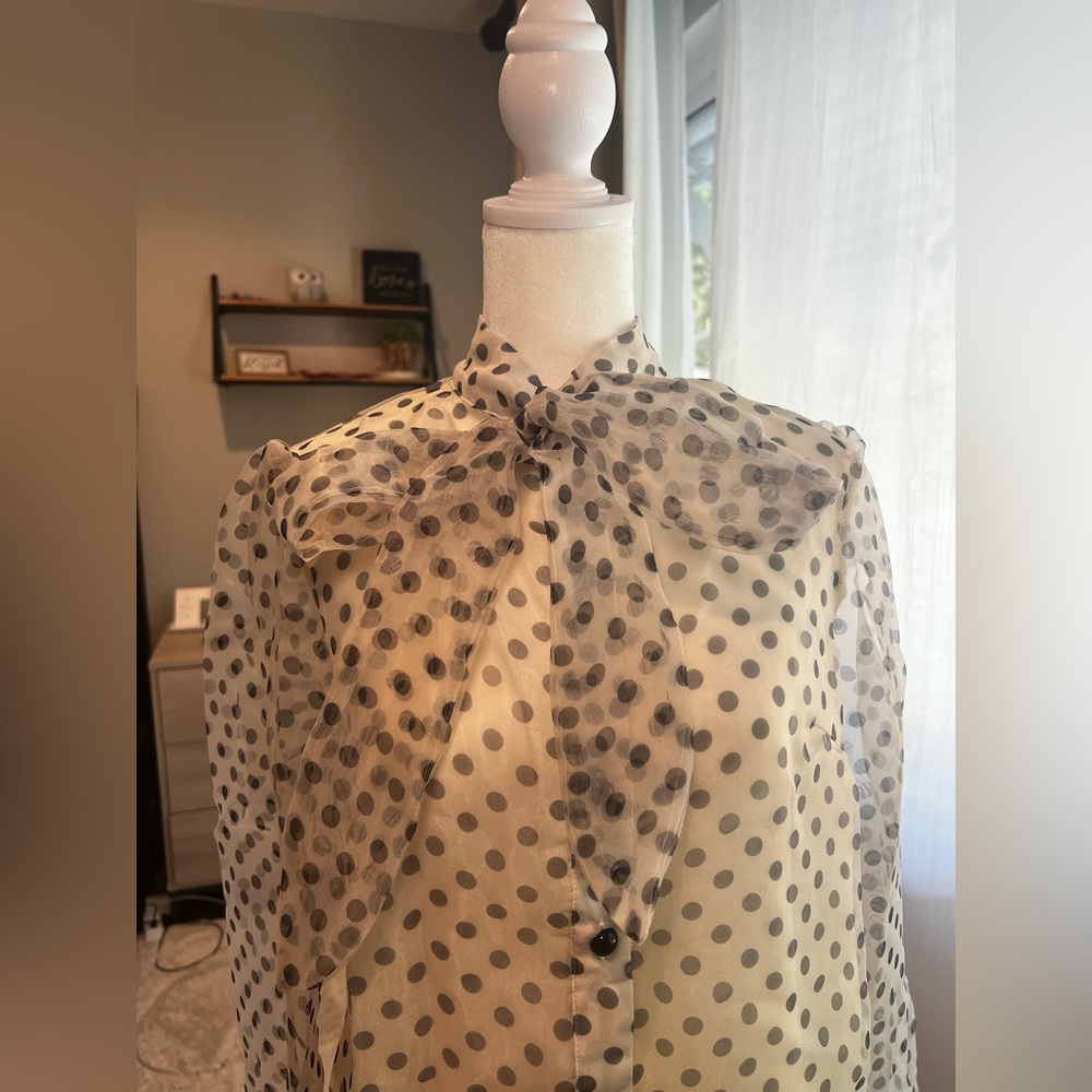 Black and white polkadot, bow button up front long sleeve.